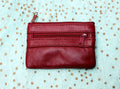 Small purse in genuine leather. Burgundy coin purse with 3 Zippers, fits credit cards, coins, bills. Small leather wallet
