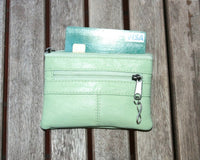 Small coin purse in genuine leather, 3 zippers. Fits credit cards, coins, bills. Small leather wallet. Beige, brown, purple, aqua green.