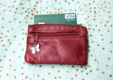 Small purse in genuine leather. Burgundy coin purse with 3 Zippers, fits credit cards, coins, bills. Small leather wallet