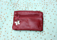 Small purse in genuine leather. Burgundy coin purse with 3 Zippers, fits credit cards, coins, bills. Small leather wallet