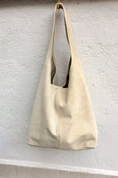 Light beige large leather bag . Zipper at the top. Soft natural suede leather bag. Slouhy BEIGE genuine leather bag. Cream suede purse