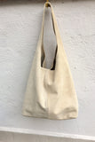 Light beige large leather bag . Zipper at the top. Soft natural suede leather bag. Slouhy BEIGE genuine leather bag. Cream suede purse