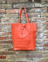 Tote bag in burnt ORANGE. Shopper bag in genuine leather to carry your laptop, tablet or books. Orange leather purse closed with a ZIPPER.