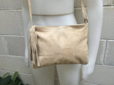 Suede leather bag in light Beige .Cross body bag, shoulder bag in GENUINE leather. Small boho leather bag with zipper and tassel.