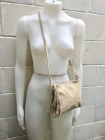 Suede leather bag in light Beige .Cross body bag, shoulder bag in GENUINE leather. Small boho leather bag with zipper and tassel.