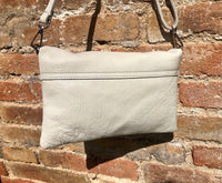 Small leather bag in light beige. Broken white cross body bag in GENUINE leather. Cream color bag with adjustable strap, zipper and flap.