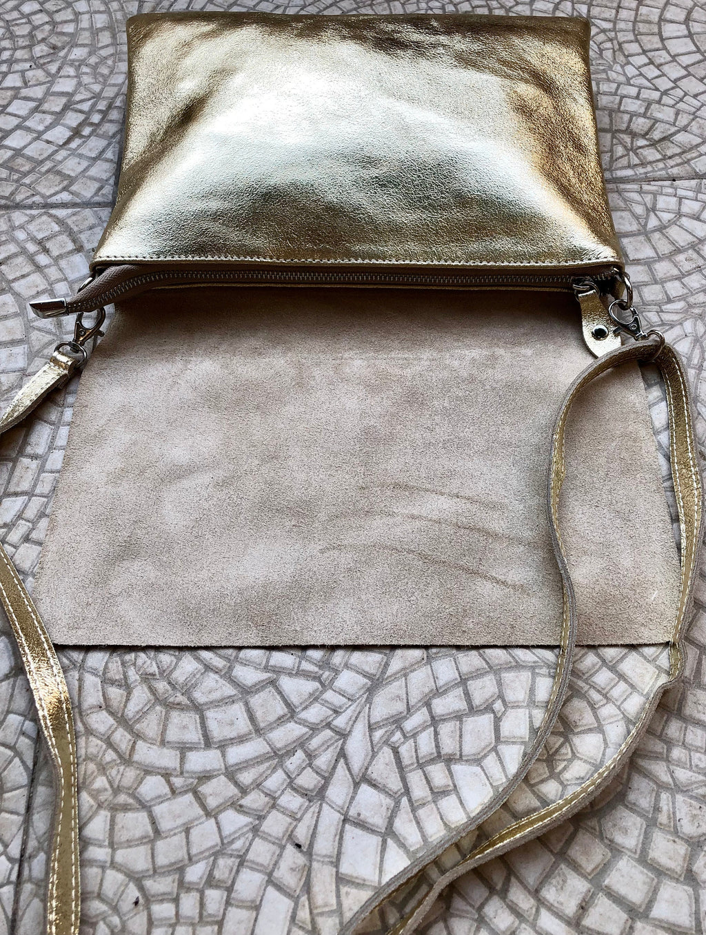 Genuine leather bag in GOLD. Cross body bag or shoulder bag in metallic shine leather. Adjustable strap, zipper and flap.Glitter leather bag