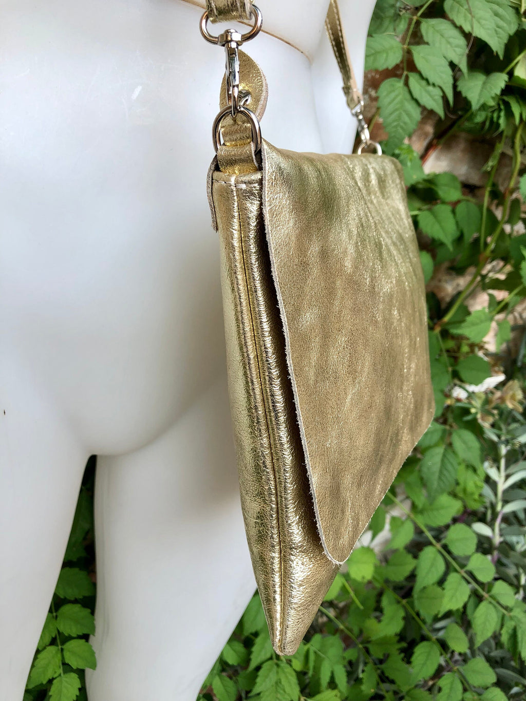 Genuine leather bag in GOLD. Cross body bag or shoulder bag in metallic shine leather. Adjustable strap, zipper and flap.Glitter leather bag