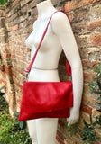 RED genuine leather bag. Cross body bag or shoulder bag in grain leather.Adjustable strap, zipper and flap.Medium size RED leather messenger