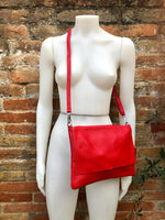 RED genuine leather bag. Cross body bag or shoulder bag in grain leather.Adjustable strap, zipper and flap.Medium size RED leather messenger