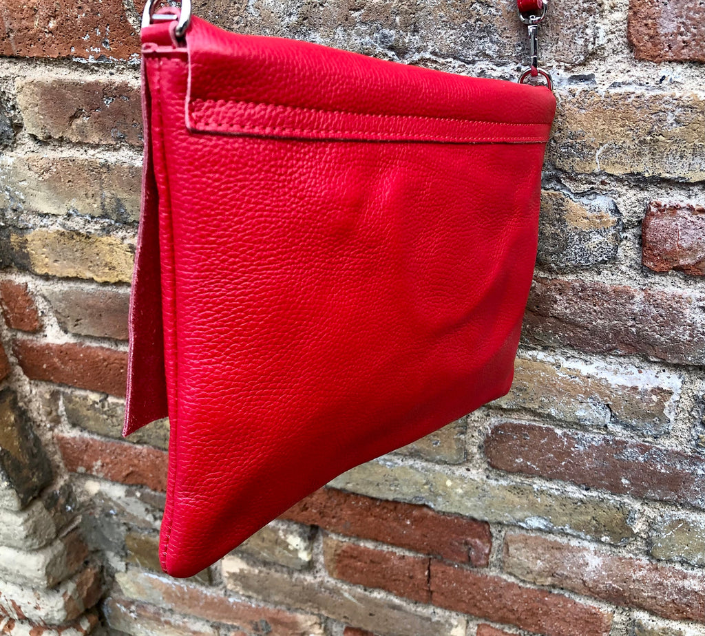 RED genuine leather bag. Cross body bag or shoulder bag in grain leather.Adjustable strap, zipper and flap.Medium size RED leather messenger