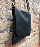 BLACK genuine leather bag. Cross body bag or shoulder bag in grain leather. Adjustable strap, zipper and flap. Medium size leather messenger