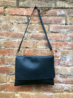 BLACK genuine leather bag. Cross body bag or shoulder bag in grain leather. Adjustable strap, zipper and flap. Medium size leather messenger