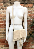 Cross body bag. BOHO suede leather bag in beige. Soft genuine suede leather. Crossover, messenger bag in suede. Small boho bag with tassel.