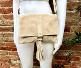 Cross body bag. BOHO suede leather bag in beige. Soft genuine suede leather. Crossover, messenger bag in suede. Small boho bag with tassel.