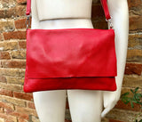 RED genuine leather bag. Cross body bag or shoulder bag in grain leather.Adjustable strap, zipper and flap.Hardware in BRONZE. Red purse