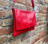 RED genuine leather bag. Cross body bag or shoulder bag in grain leather.Adjustable strap, zipper and flap.Medium size RED leather messenger