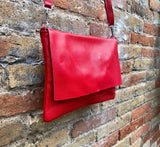 RED genuine leather bag. Cross body bag or shoulder bag in grain leather.Adjustable strap, zipper and flap.Medium size RED leather messenger