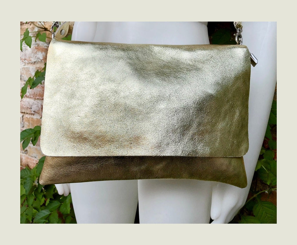 Genuine leather bag in GOLD. Cross body bag or shoulder bag in metallic shine leather. Adjustable strap, zipper and flap.Glitter leather bag
