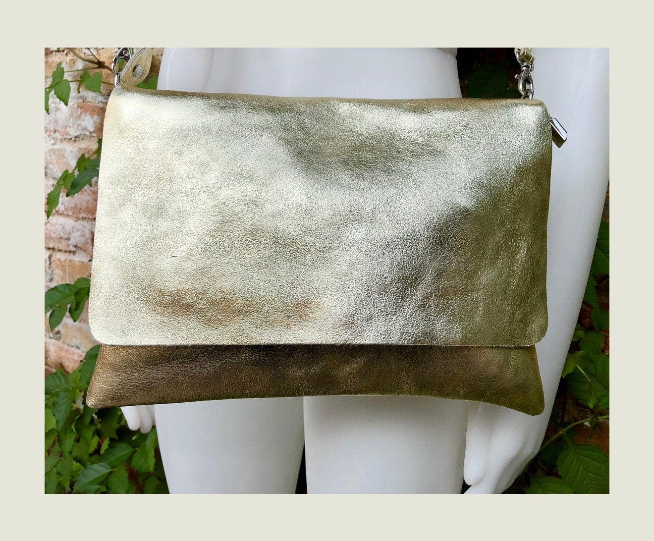Genuine leather bag in GOLD. Cross body bag or shoulder bag in metallic shine leather. Adjustable strap, zipper and flap.Glitter leather bag