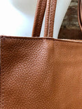 NEW with zipper and lining. large tote leather bag in CAMEL BROWN. Soft genuine leather shopper. Carry all bag for laptops, tablets, books..