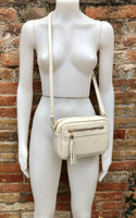 Small leather bag in CREAM BEIGE. Cross body bag, shoulder bag in GENUINE leather. Beige bag with adjustable strap and zippers. Gold accents