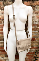 Small leather bag in dark beige. Genuine leather crossbody / shoulder bag. Light brown leather bag with adjustable strap, zipper and flap.