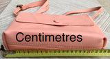 Small leather bag in pink. Cross body or shoulder bag in GENUINE leather. Pink leather bag with adjustable strap, zipper and flap.