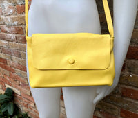 Small leather bag in yellow. Cross body or shoulder bag in GENUINE leather. Yellow leather bag with adjustable strap, zipper and flap.