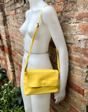 Small leather bag in yellow. Cross body or shoulder bag in GENUINE leather. Yellow leather bag with adjustable strap, zipper and flap.