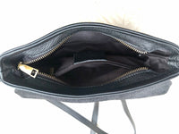 Small leather bag in black. Cross body or shoulder bag in GENUINE leather. Black leather bag with adjustable strap, zipper and flap.