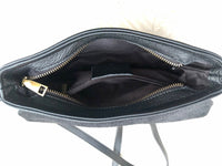 Small leather bag in black. Cross body or shoulder bag in GENUINE leather. Black leather bag with adjustable strap, zipper and flap.