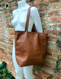 NEW with zipper and lining. large tote leather bag in CAMEL BROWN. Soft genuine leather shopper. Carry all bag for laptops, tablets, books..