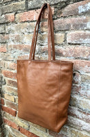 NEW with zipper and lining. large tote leather bag in CAMEL BROWN. Soft genuine leather shopper. Carry all bag for laptops, tablets, books..