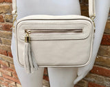 Small leather bag in CREAM BEIGE. Cross body bag, shoulder bag in GENUINE leather. Beige bag with adjustable strap and zippers. Gold accents