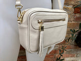 Small leather bag in CREAM BEIGE. Cross body bag, shoulder bag in GENUINE leather. Beige bag with adjustable strap and zippers. Gold accents