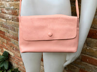 Small leather bag in pink. Cross body or shoulder bag in GENUINE leather. Pink leather bag with adjustable strap, zipper and flap.