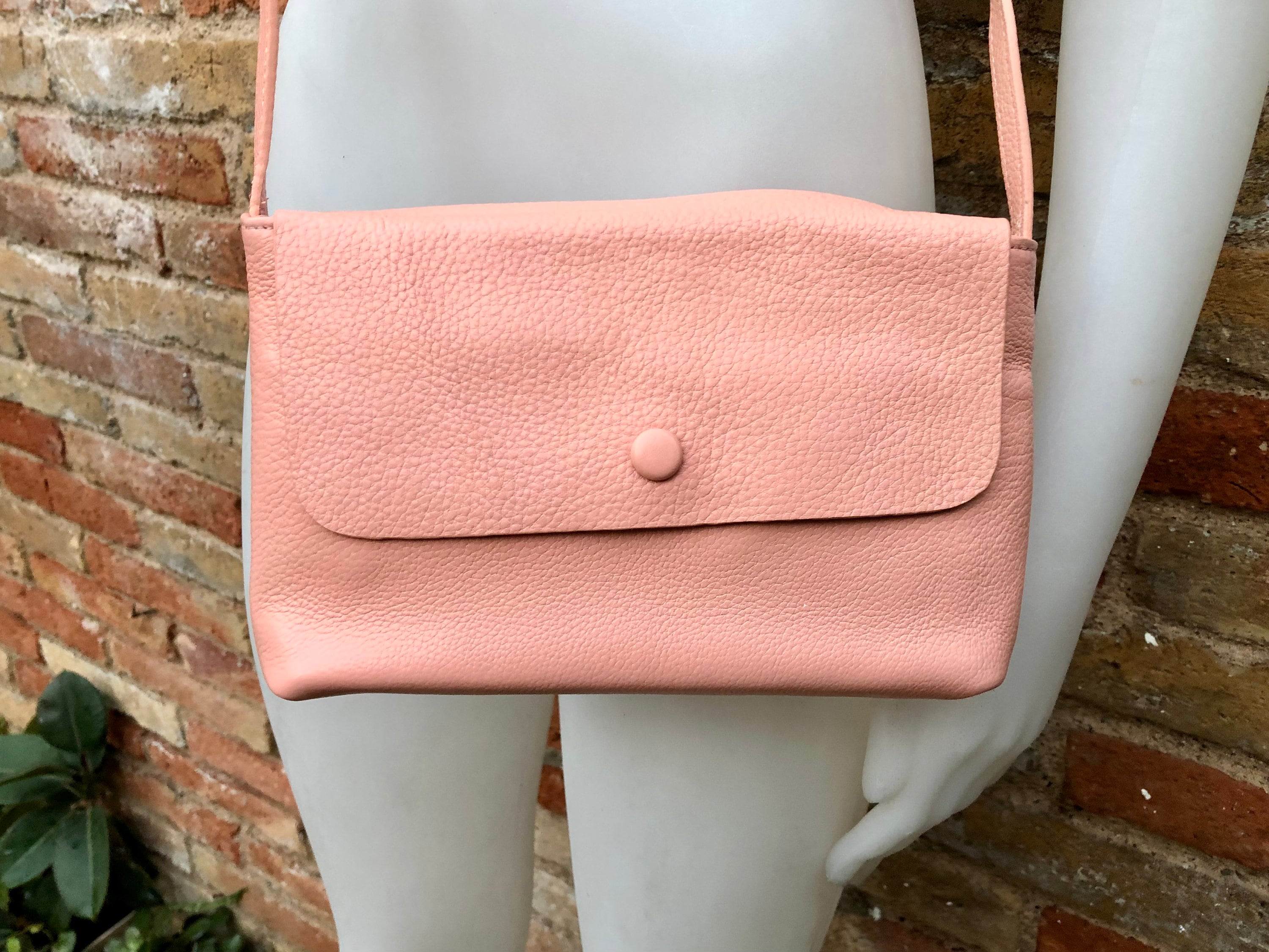Small leather bag in pink. Cross body or shoulder bag in GENUINE leather. Pink leather bag with adjustable strap, zipper and flap.