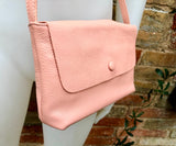 Small leather bag in pink. Cross body or shoulder bag in GENUINE leather. Pink leather bag with adjustable strap, zipper and flap.