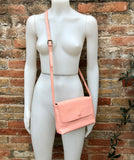 Small leather bag in pink. Cross body or shoulder bag in GENUINE leather. Pink leather bag with adjustable strap, zipper and flap.