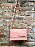 Small leather bag in pink. Cross body or shoulder bag in GENUINE leather. Pink leather bag with adjustable strap, zipper and flap.