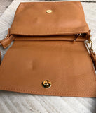 Small camel brown genuine leather bag. Light brown cross body or shoulder bag. Tan leather purse with adjustable strap zipper and flap.