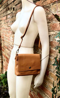 Small camel brown genuine leather bag. Light brown cross body or shoulder bag. Tan leather purse with adjustable strap zipper and flap.