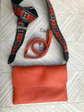 Orange small leather bag. 2 straps: 1 leather + 1 guitar strap. GENUINE leather Crossbody / shoulder bag. Orange purse with flap and zipper