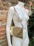 Small leather bag in GOLD. Cross body bag, shoulder bag in GENUINE leather. Metallic shine bag with adjustable strap, zipper and flap.