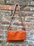 Orange leather bag. 2 straps: 1 leather + 1 guitar strap. GENUINE leather Crossbody / shoulder bag. Small orange purse with flap and zipper