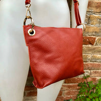 Terracotta leather bag. Orange-brown cross body / shoulder bag. Genuine leather purse with adjustable strap and zipper. Soft leather bag