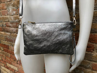 Small leather bag in DARK SILVER. Crossbody, shoulder bag or wristlet in GENUINE leather. Metallic pewter gray purse + adjustable strap.