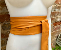 Light camel orange obi belt. Wrap belt in soft genuine leather. Wraparound waist belt. Wide style. Boho dress belt in light orange leather