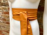 Light camel orange obi belt. Wrap belt in soft genuine leather. Wraparound waist belt. Wide style. Boho dress belt in light orange leather